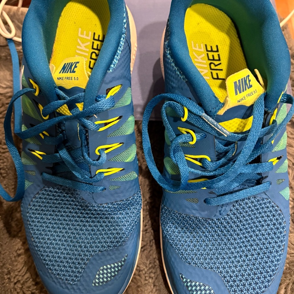 Nike Free 5.0 Blue Running Shoes with Yellow Accents